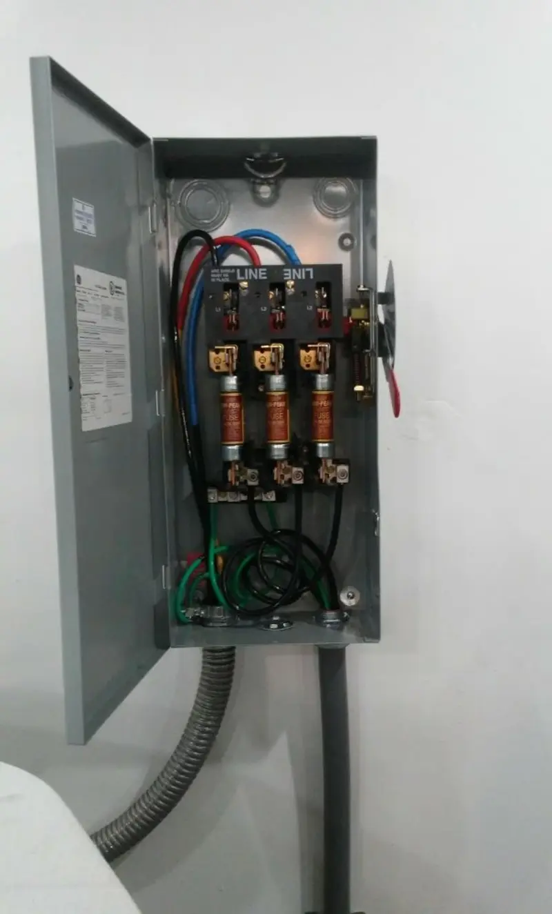 Three-phase disconnect switch installed for Smoke Detector Installation in London